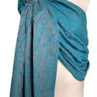 Ring sling from Fräulein Hübsch on a tailor's dummy. Turquoise fabric with a gray pattern.