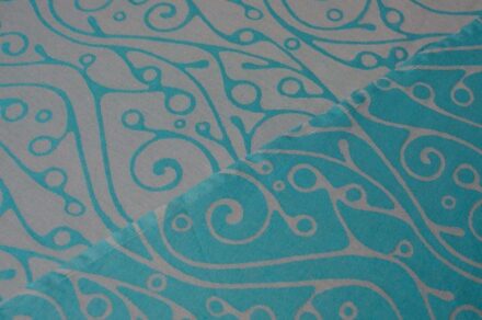 Fräulein Hübsch turquoise sling with a curved, light gray pattern